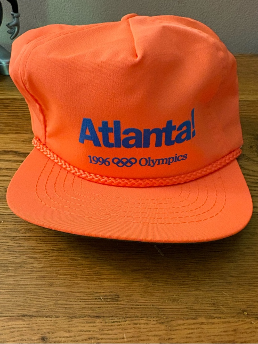 Atlanta 1996 Olympics neon orange rope hat. NWOT.